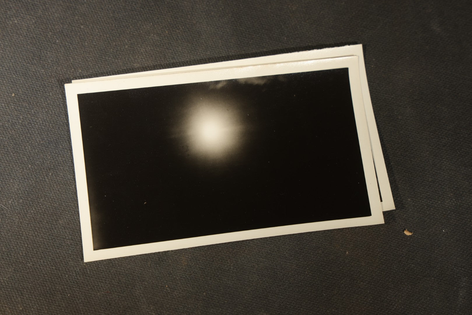 Grouping of 11 Vintage Snapshot Photographs with Negatives of the 1932 Solar Eclipse including Partial and Total Eclipse Phases and Eclipse Viewers with American Flag