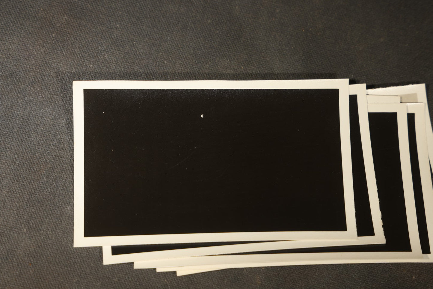 Grouping of 11 Vintage Snapshot Photographs with Negatives of the 1932 Solar Eclipse including Partial and Total Eclipse Phases and Eclipse Viewers with American Flag