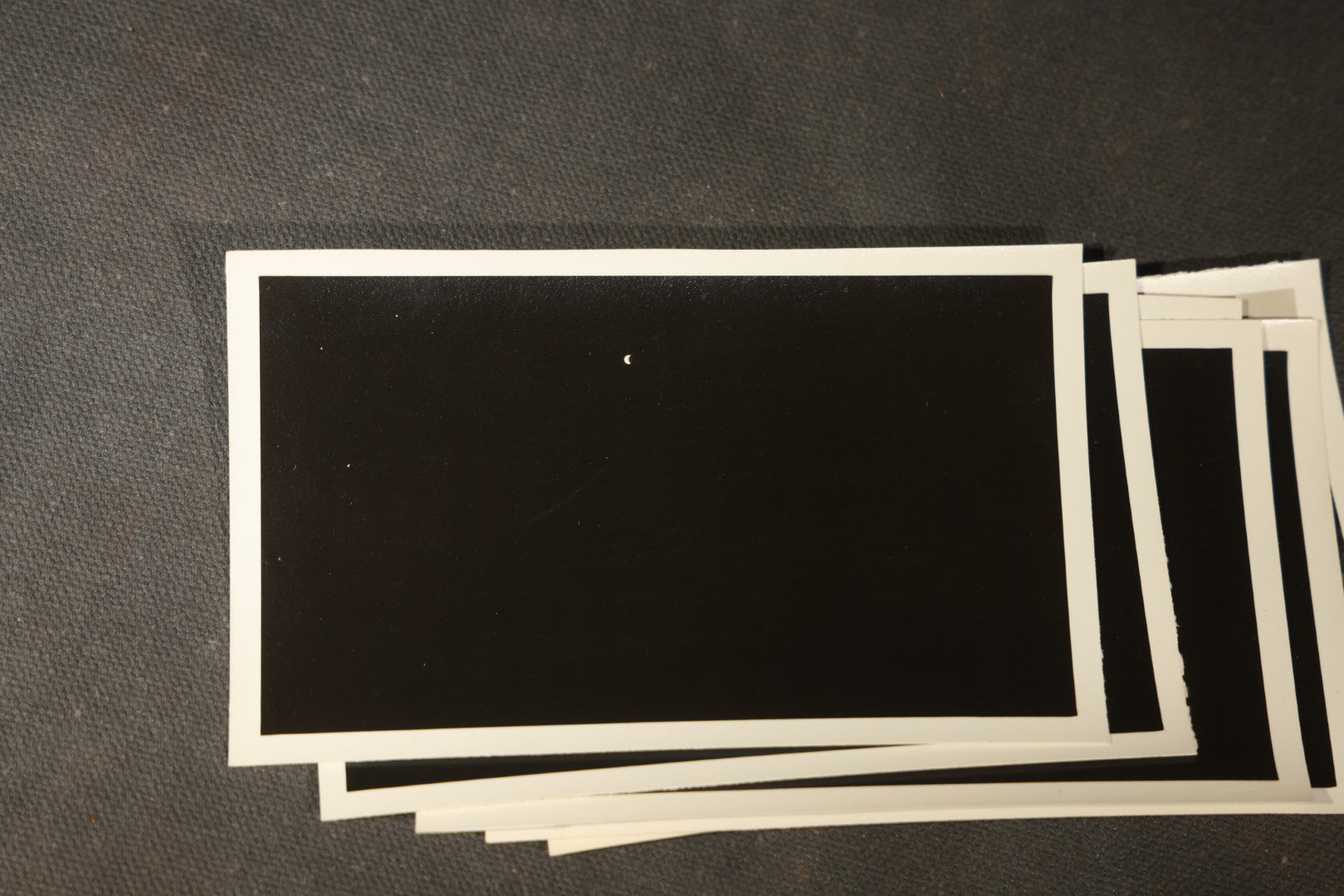 Grouping of 11 Vintage Snapshot Photographs with Negatives of the 1932 Solar Eclipse including Partial and Total Eclipse Phases and Eclipse Viewers with American Flag