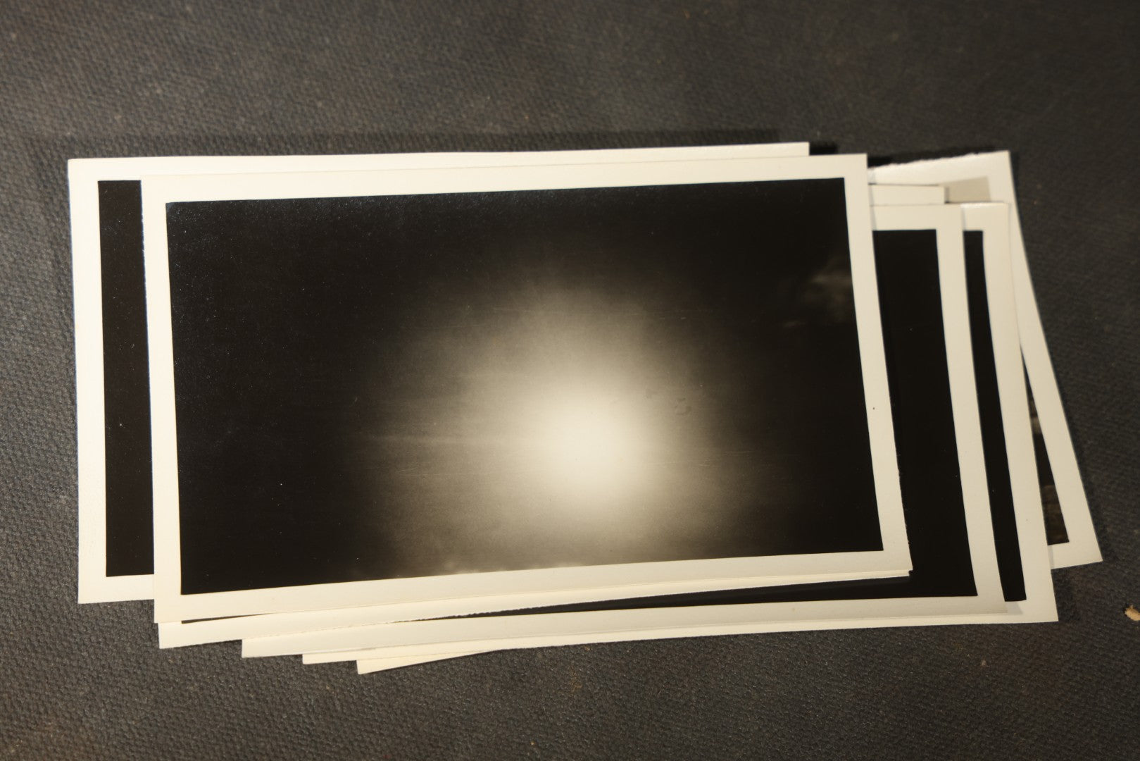Grouping of 11 Vintage Snapshot Photographs with Negatives of the 1932 Solar Eclipse including Partial and Total Eclipse Phases and Eclipse Viewers with American Flag