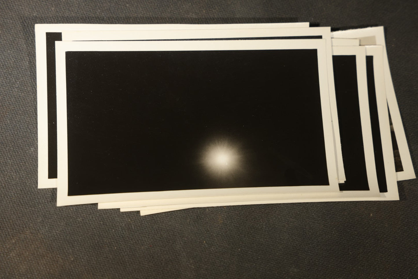 Grouping of 11 Vintage Snapshot Photographs with Negatives of the 1932 Solar Eclipse including Partial and Total Eclipse Phases and Eclipse Viewers with American Flag