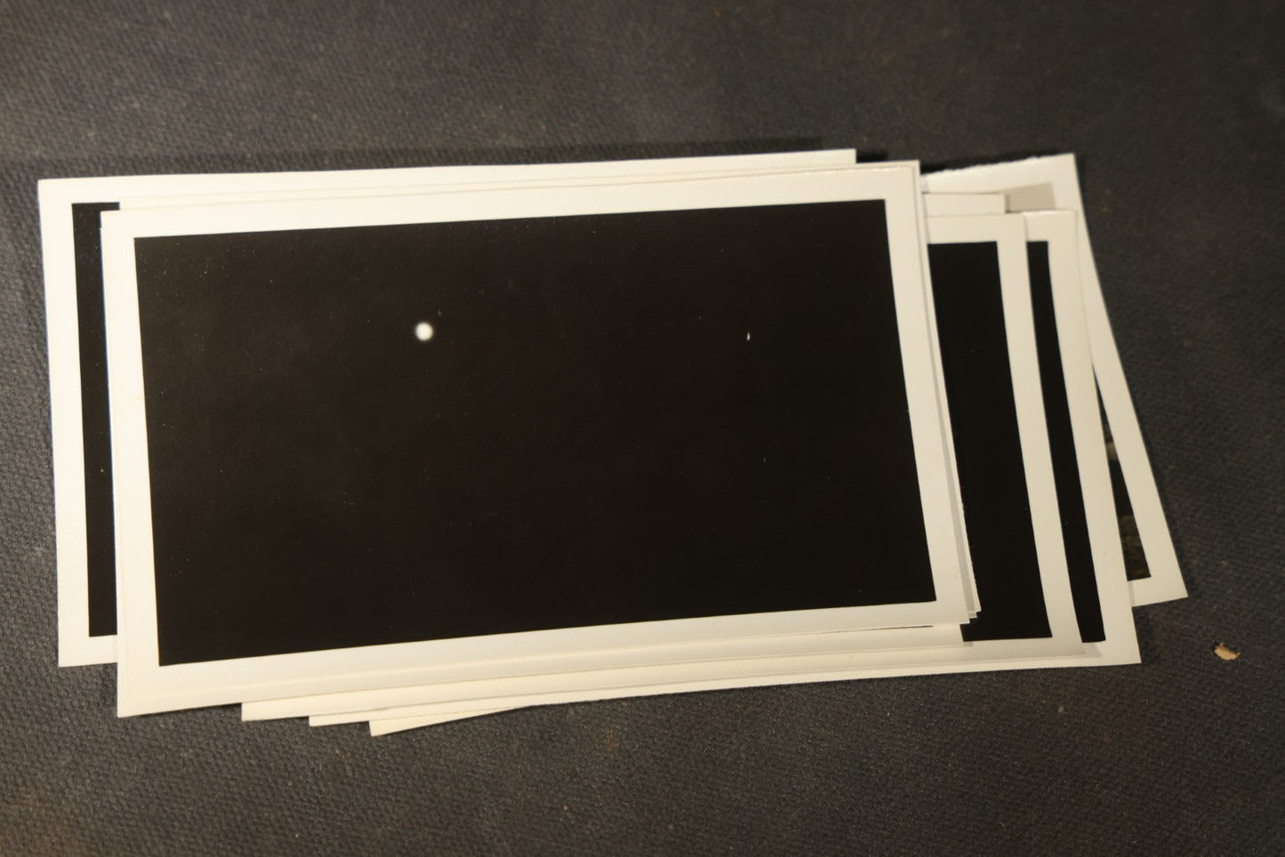 Grouping of 11 Vintage Snapshot Photographs with Negatives of the 1932 Solar Eclipse including Partial and Total Eclipse Phases and Eclipse Viewers with American Flag