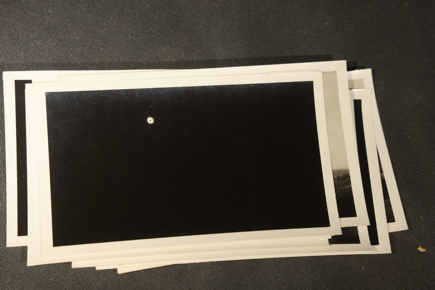 Grouping of 11 Vintage Snapshot Photographs with Negatives of the 1932 Solar Eclipse including Partial and Total Eclipse Phases and Eclipse Viewers with American Flag