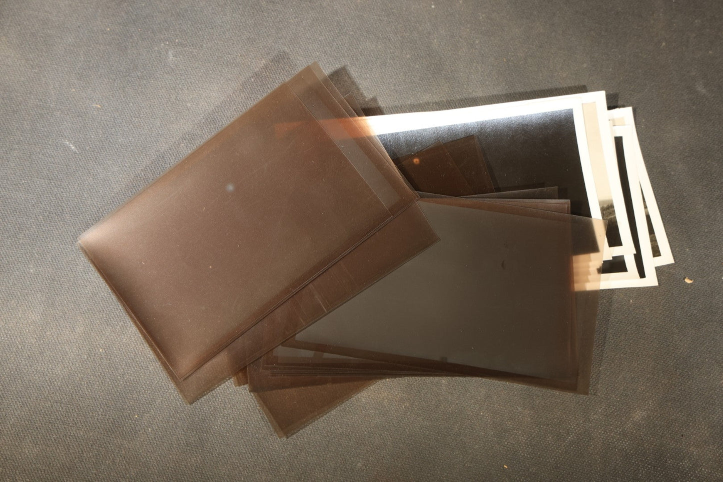 Grouping of 11 Vintage Snapshot Photographs with Negatives of the 1932 Solar Eclipse including Partial and Total Eclipse Phases and Eclipse Viewers with American Flag
