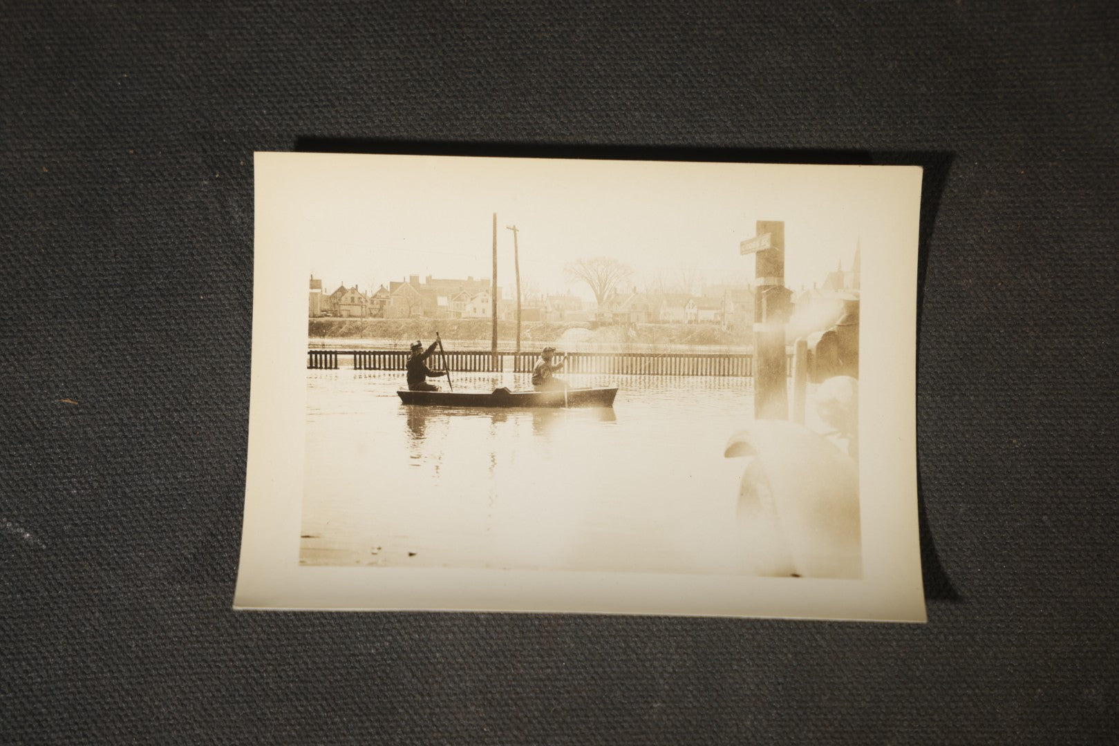 Vintage Grouping of Approximately 40 Snapshot Photographs and Negatives Documenting a Flood in Nashua, New Hampshire, in Fred W. Perkins Photo Finishing Envelope Marked "Flood Films"