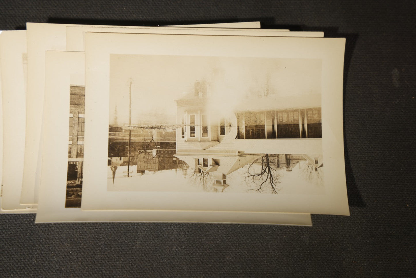 Vintage Grouping of Approximately 40 Snapshot Photographs and Negatives Documenting a Flood in Nashua, New Hampshire, in Fred W. Perkins Photo Finishing Envelope Marked "Flood Films"
