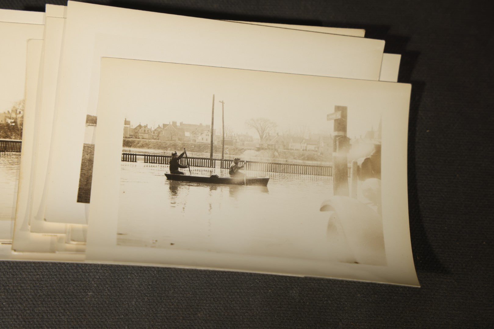 Vintage Grouping of Approximately 40 Snapshot Photographs and Negatives Documenting a Flood in Nashua, New Hampshire, in Fred W. Perkins Photo Finishing Envelope Marked "Flood Films"