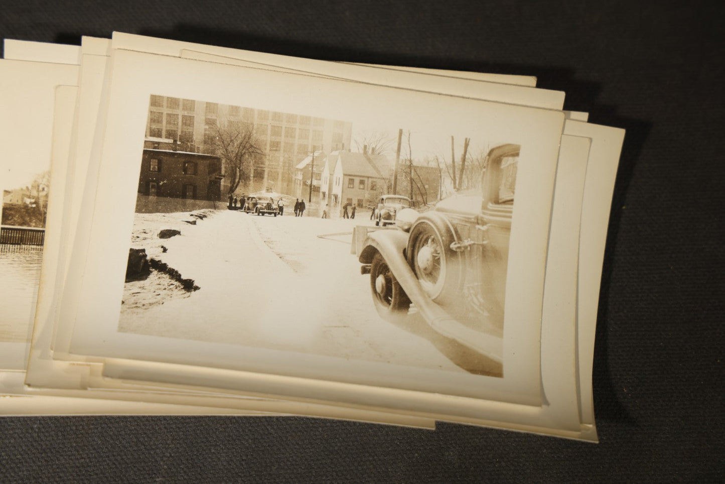 Vintage Grouping of Approximately 40 Snapshot Photographs and Negatives Documenting a Flood in Nashua, New Hampshire, in Fred W. Perkins Photo Finishing Envelope Marked "Flood Films"