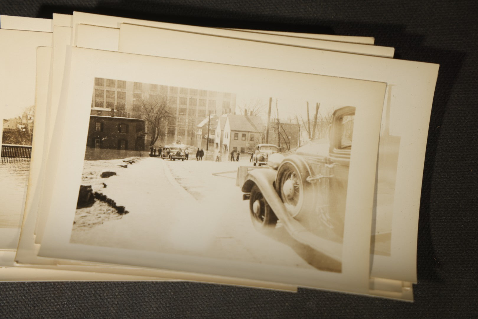 Vintage Grouping of Approximately 40 Snapshot Photographs and Negatives Documenting a Flood in Nashua, New Hampshire, in Fred W. Perkins Photo Finishing Envelope Marked "Flood Films"