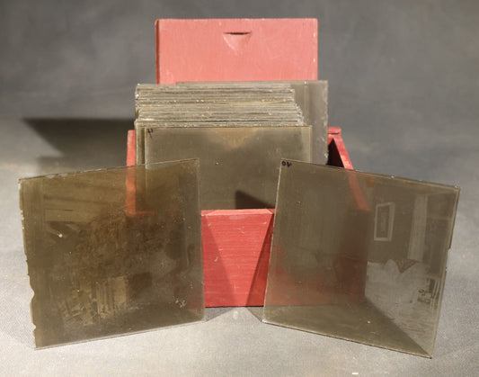 Grouping of 38 Antique Glass Plate Photographic Negatives including Interior and Exterior Views, Portraits, and Domestic Scenes