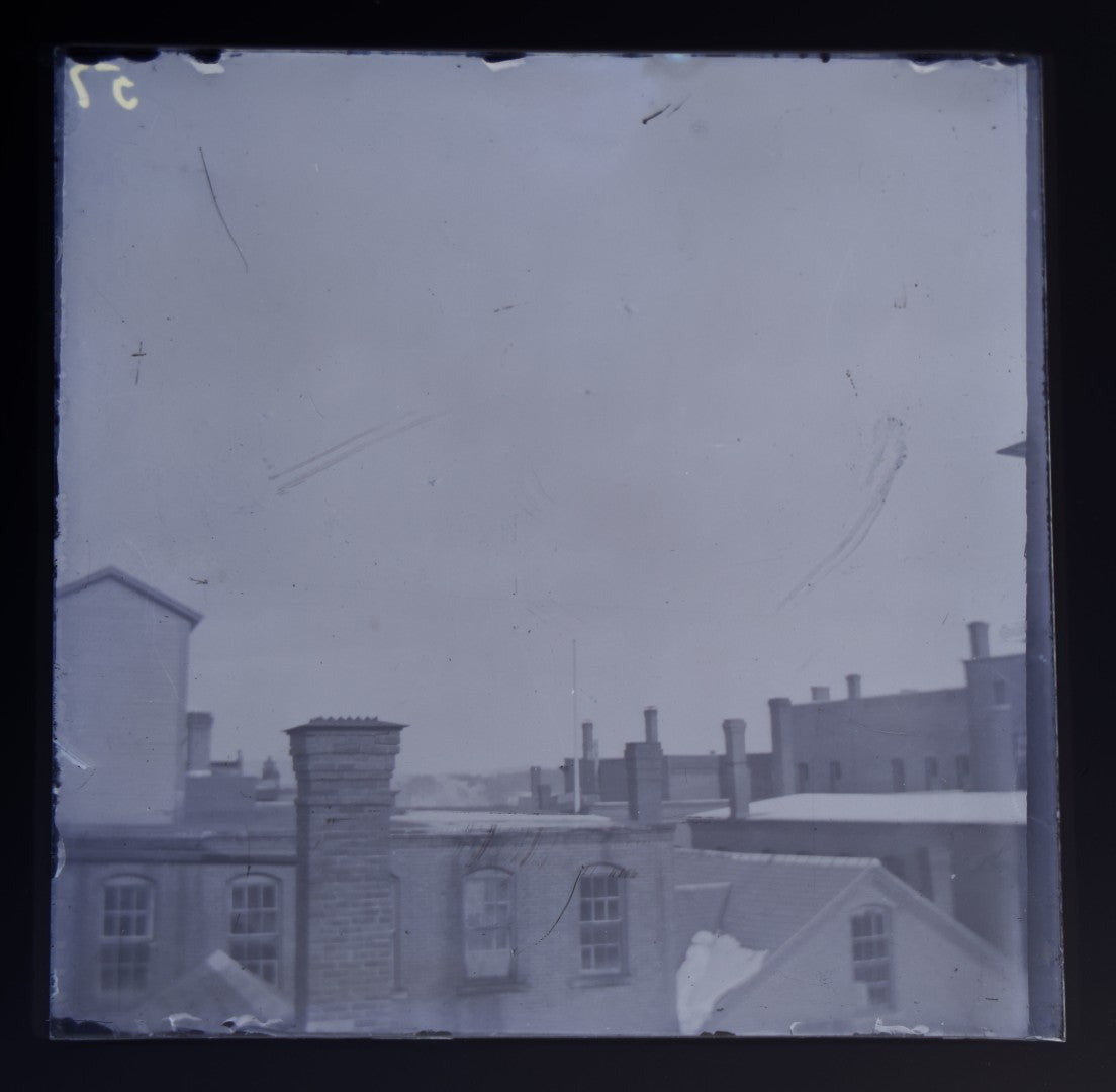 Grouping of 38 Antique Glass Plate Photographic Negatives including Interior and Exterior Views, Portraits, and Domestic Scenes