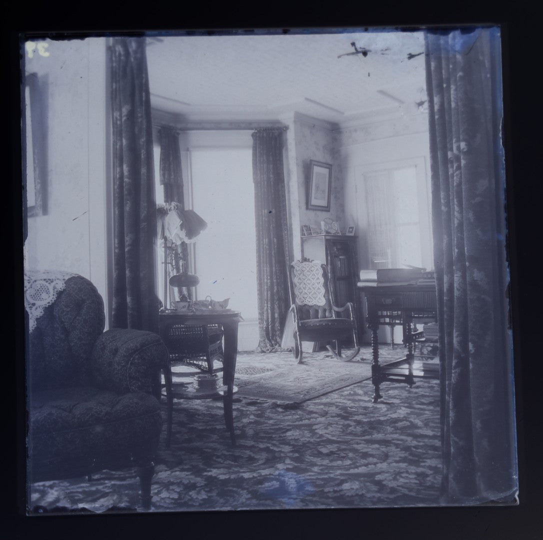 Grouping of 38 Antique Glass Plate Photographic Negatives including Interior and Exterior Views, Portraits, and Domestic Scenes