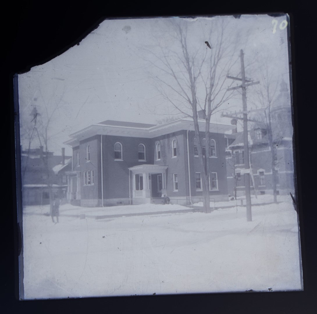 Grouping of 38 Antique Glass Plate Photographic Negatives including Interior and Exterior Views, Portraits, and Domestic Scenes