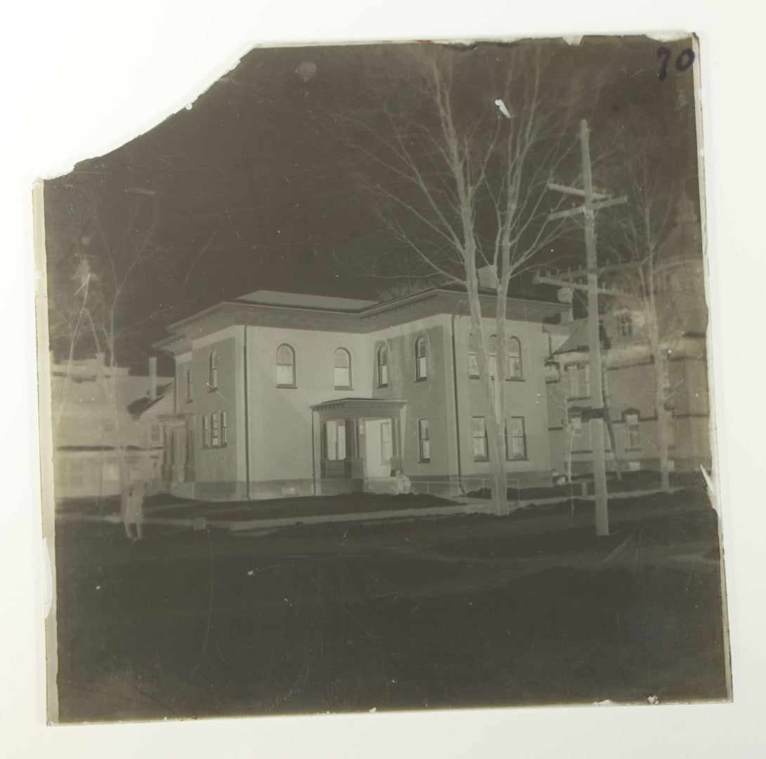 Grouping of 38 Antique Glass Plate Photographic Negatives including Interior and Exterior Views, Portraits, and Domestic Scenes