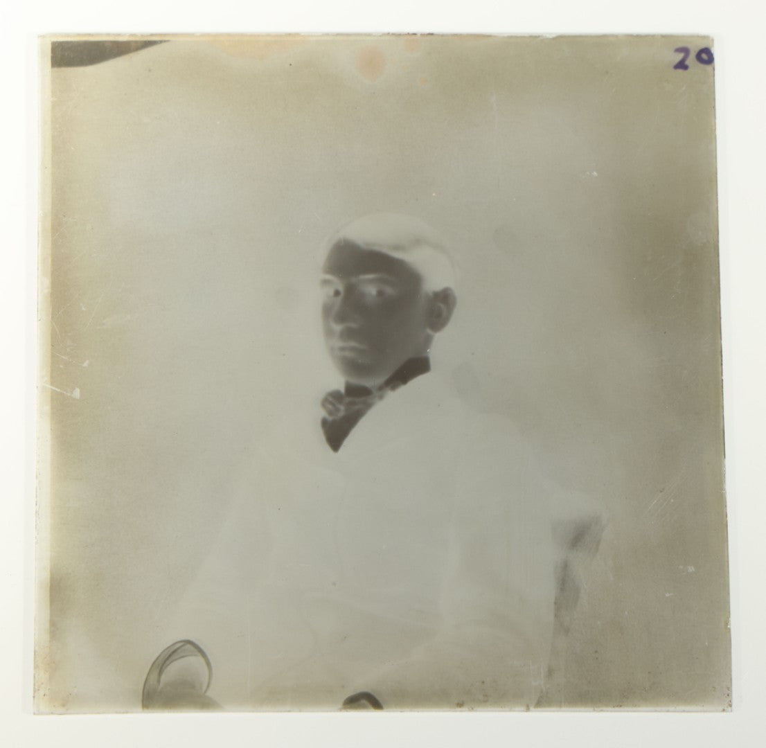 Grouping of 38 Antique Glass Plate Photographic Negatives including Interior and Exterior Views, Portraits, and Domestic Scenes