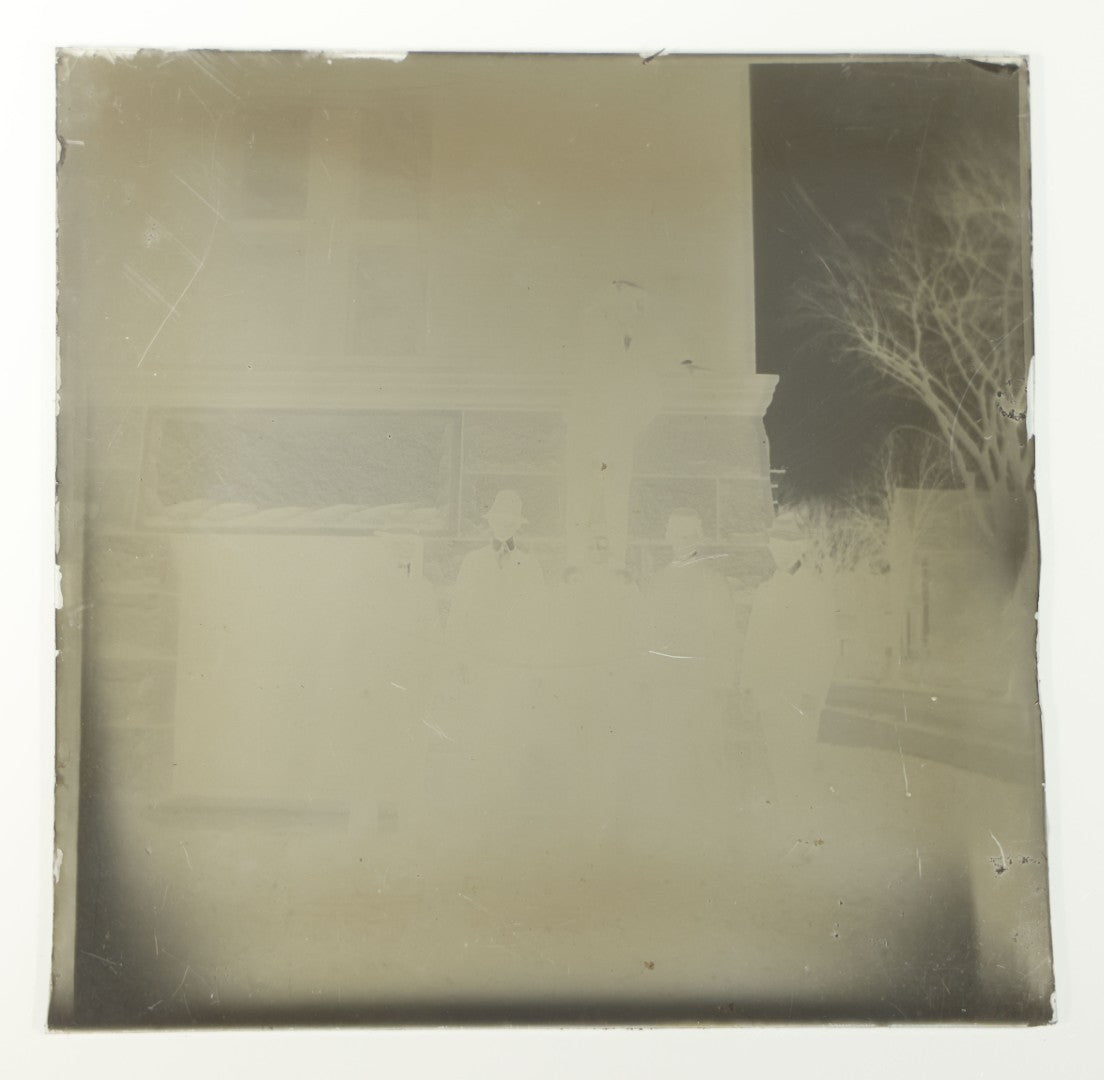 Grouping of 38 Antique Glass Plate Photographic Negatives including Interior and Exterior Views, Portraits, and Domestic Scenes