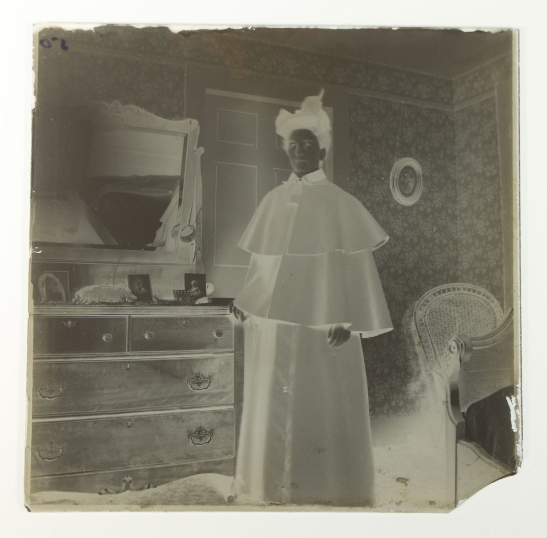 Grouping of 38 Antique Glass Plate Photographic Negatives including Interior and Exterior Views, Portraits, and Domestic Scenes