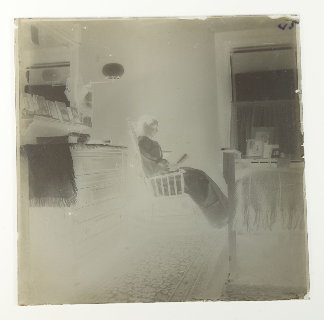 Grouping of 38 Antique Glass Plate Photographic Negatives including Interior and Exterior Views, Portraits, and Domestic Scenes