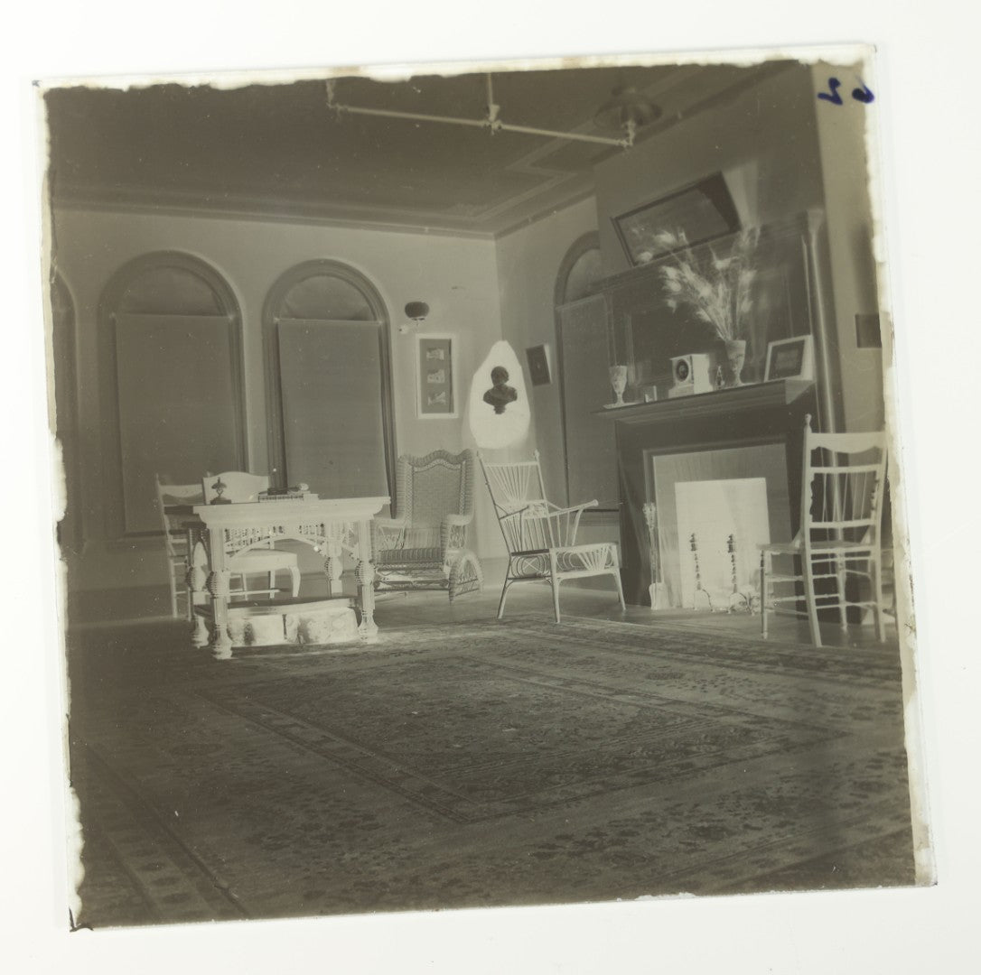 Grouping of 38 Antique Glass Plate Photographic Negatives including Interior and Exterior Views, Portraits, and Domestic Scenes