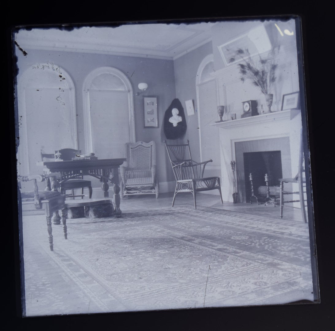 Grouping of 38 Antique Glass Plate Photographic Negatives including Interior and Exterior Views, Portraits, and Domestic Scenes