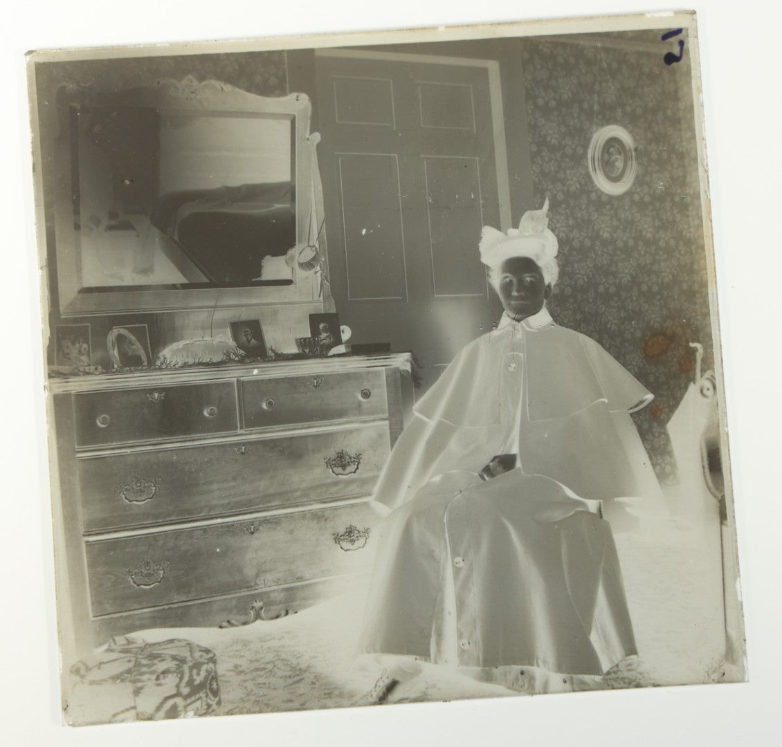 Grouping of 38 Antique Glass Plate Photographic Negatives including Interior and Exterior Views, Portraits, and Domestic Scenes