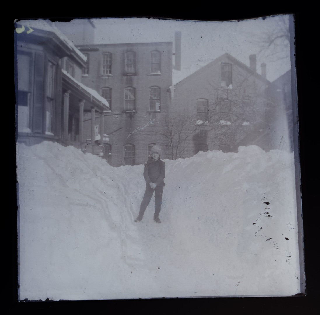 Grouping of 38 Antique Glass Plate Photographic Negatives including Interior and Exterior Views, Portraits, and Domestic Scenes