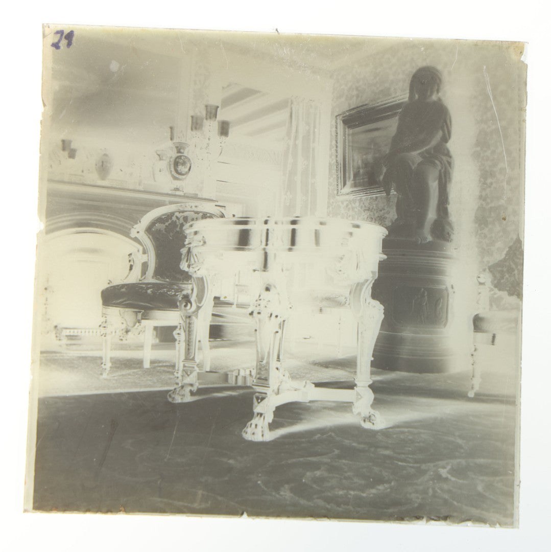 Grouping of 38 Antique Glass Plate Photographic Negatives including Interior and Exterior Views, Portraits, and Domestic Scenes