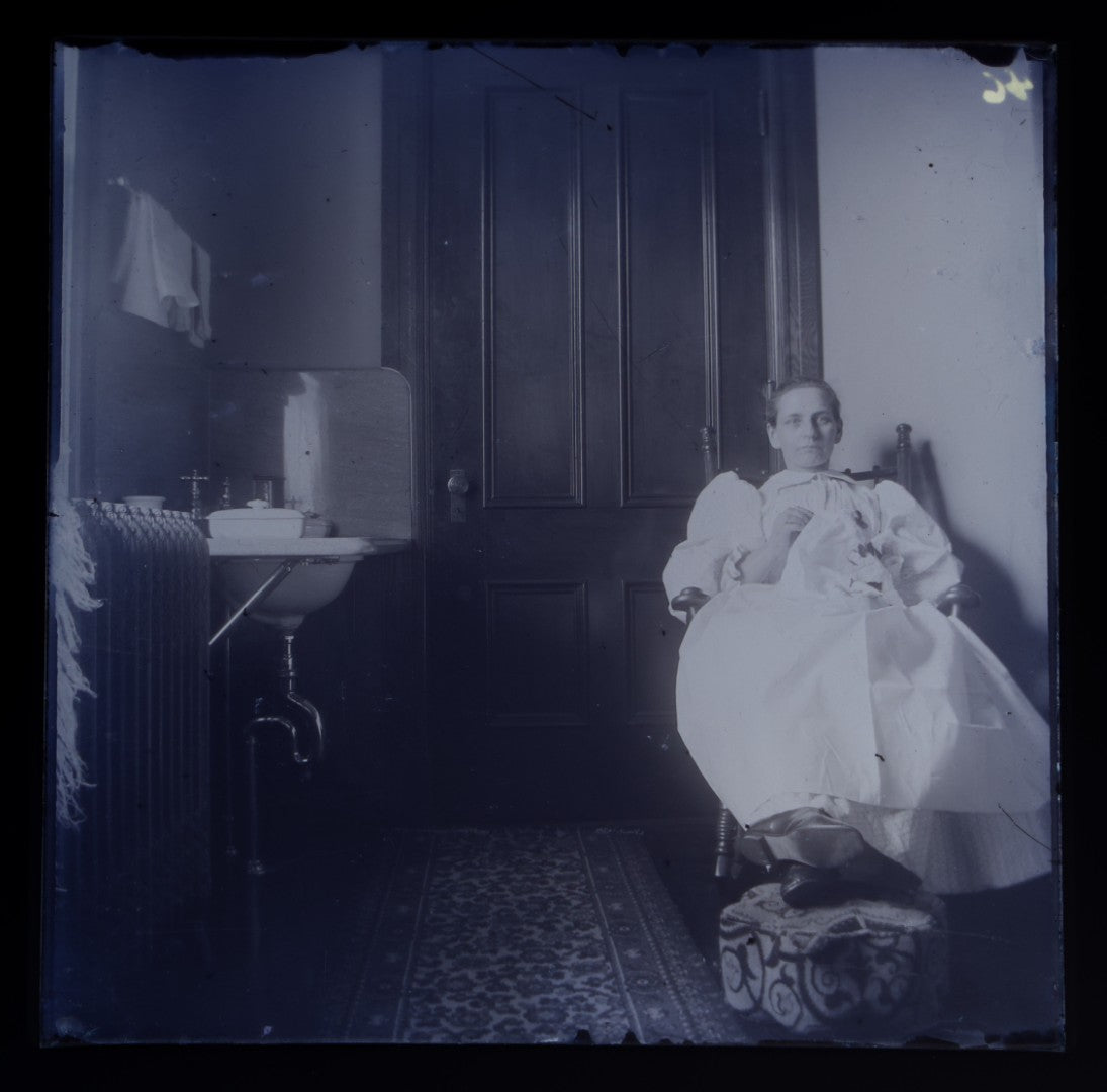 Grouping of 38 Antique Glass Plate Photographic Negatives including Interior and Exterior Views, Portraits, and Domestic Scenes