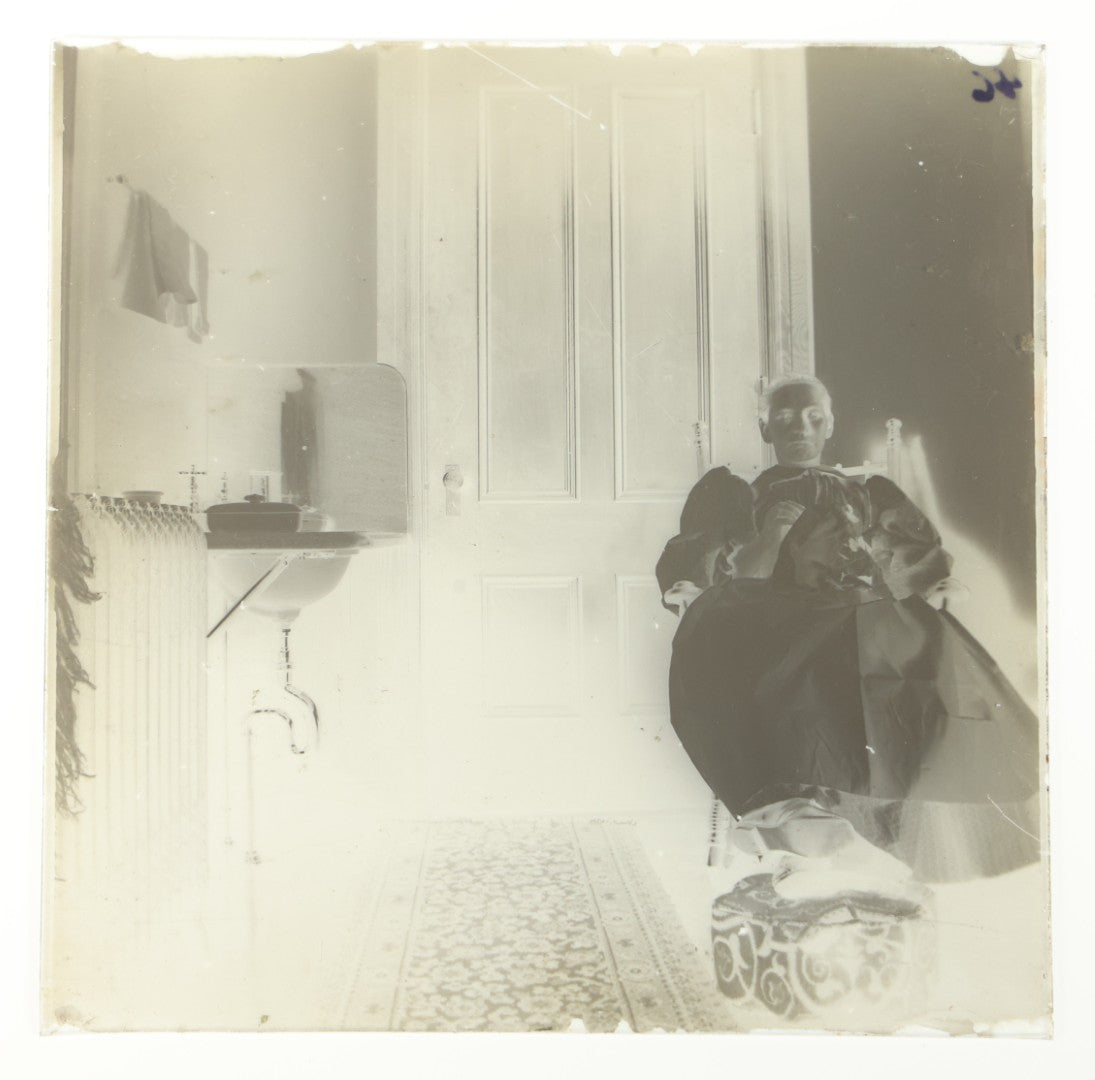 Grouping of 38 Antique Glass Plate Photographic Negatives including Interior and Exterior Views, Portraits, and Domestic Scenes
