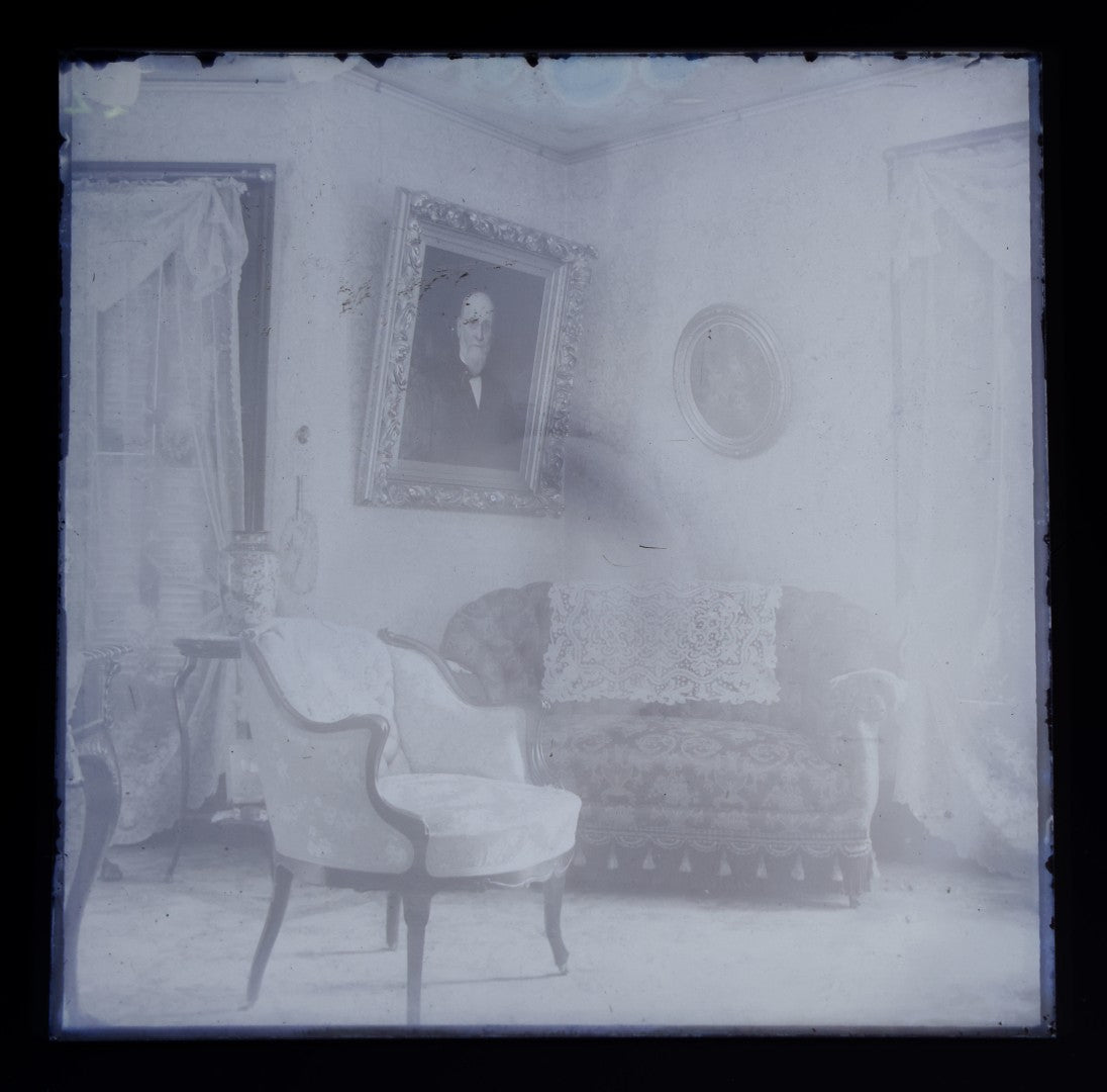 Grouping of 38 Antique Glass Plate Photographic Negatives including Interior and Exterior Views, Portraits, and Domestic Scenes