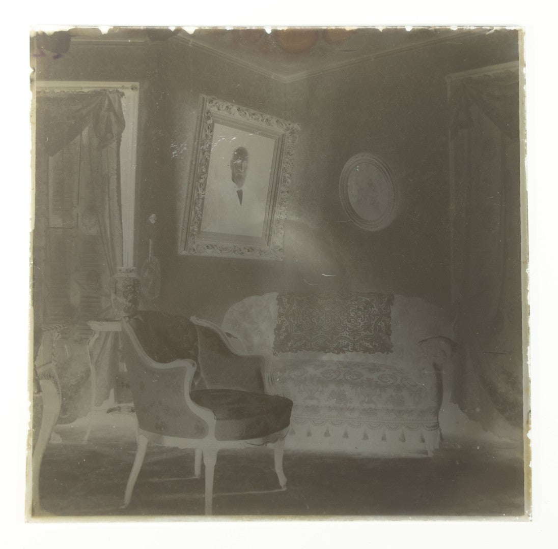 Grouping of 38 Antique Glass Plate Photographic Negatives including Interior and Exterior Views, Portraits, and Domestic Scenes