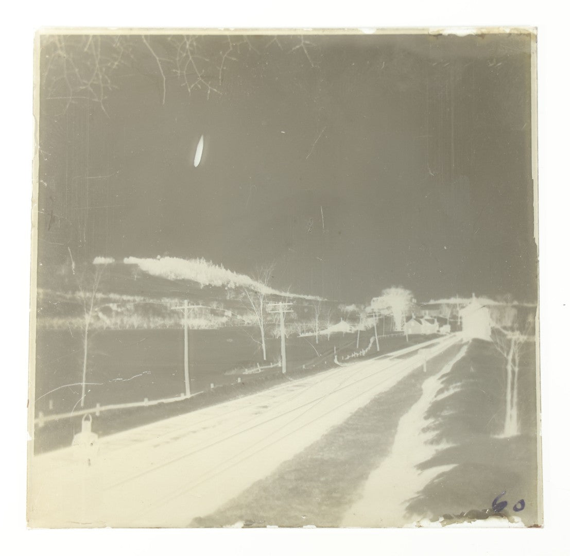 Grouping of 38 Antique Glass Plate Photographic Negatives including Interior and Exterior Views, Portraits, and Domestic Scenes
