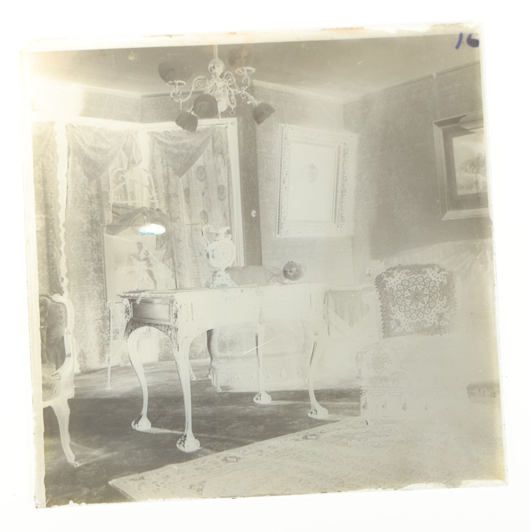 Grouping of 38 Antique Glass Plate Photographic Negatives including Interior and Exterior Views, Portraits, and Domestic Scenes