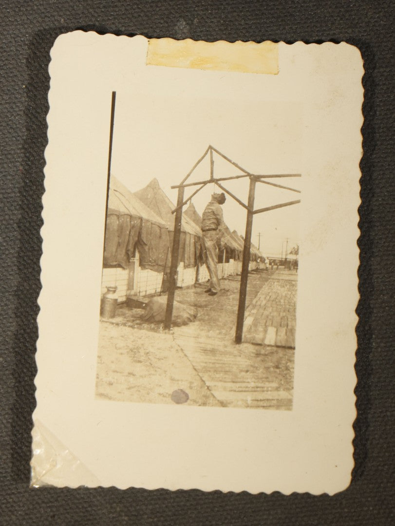 Grouping of 14 Vintage Snapshot Photographs of Costumes, Masks, and Oddities including Grim Reaper Painted Smock, Barber Shop Gag Scene, and Camp Blanding Military Stunt