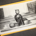 Lot 119 - Vintage Halloween Snapshot Photo Album of a Child in Black Cat Costume with Jack-O-Lanterns and Carved Pumpkins, October 1952, Woodman Photo