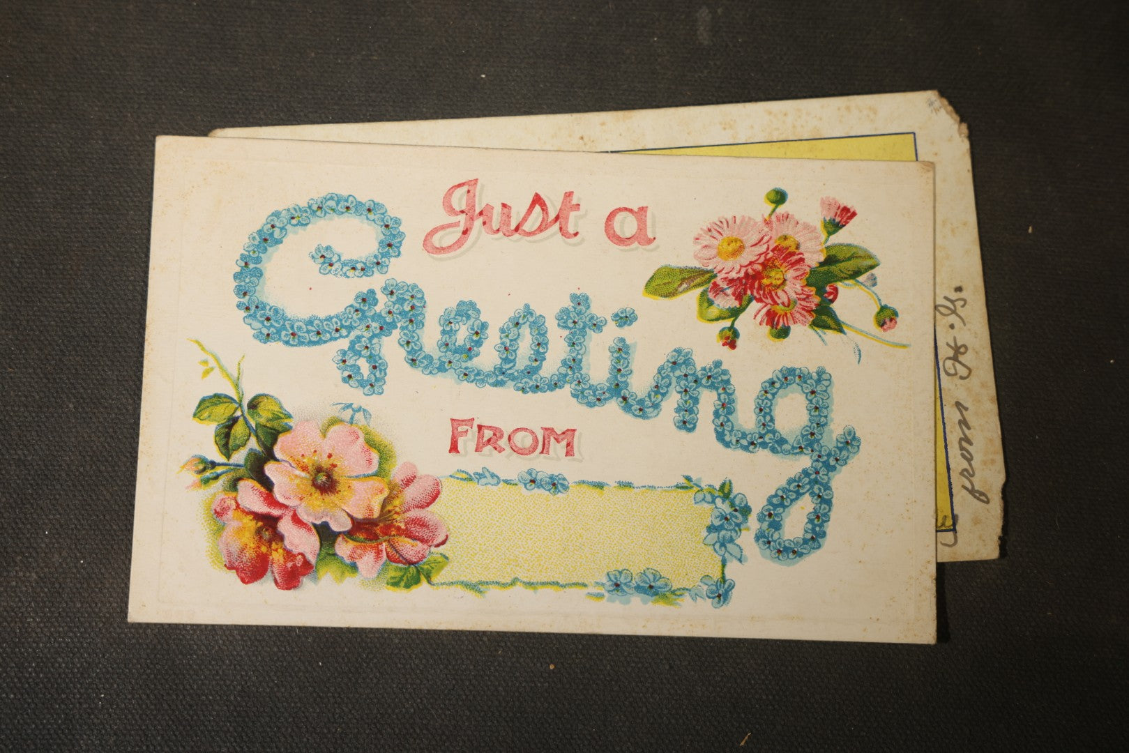 Grouping of approximately 25 Antique and Vintage Postcards including Comic, Greeting, Floral, and Holiday Subjects