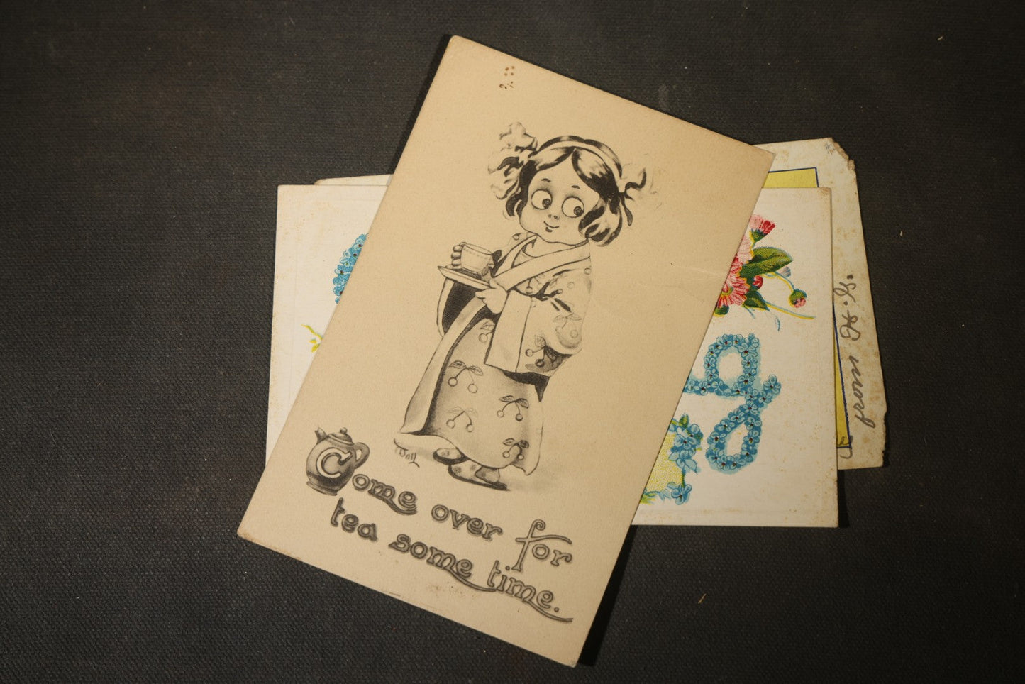 Grouping of approximately 25 Antique and Vintage Postcards including Comic, Greeting, Floral, and Holiday Subjects