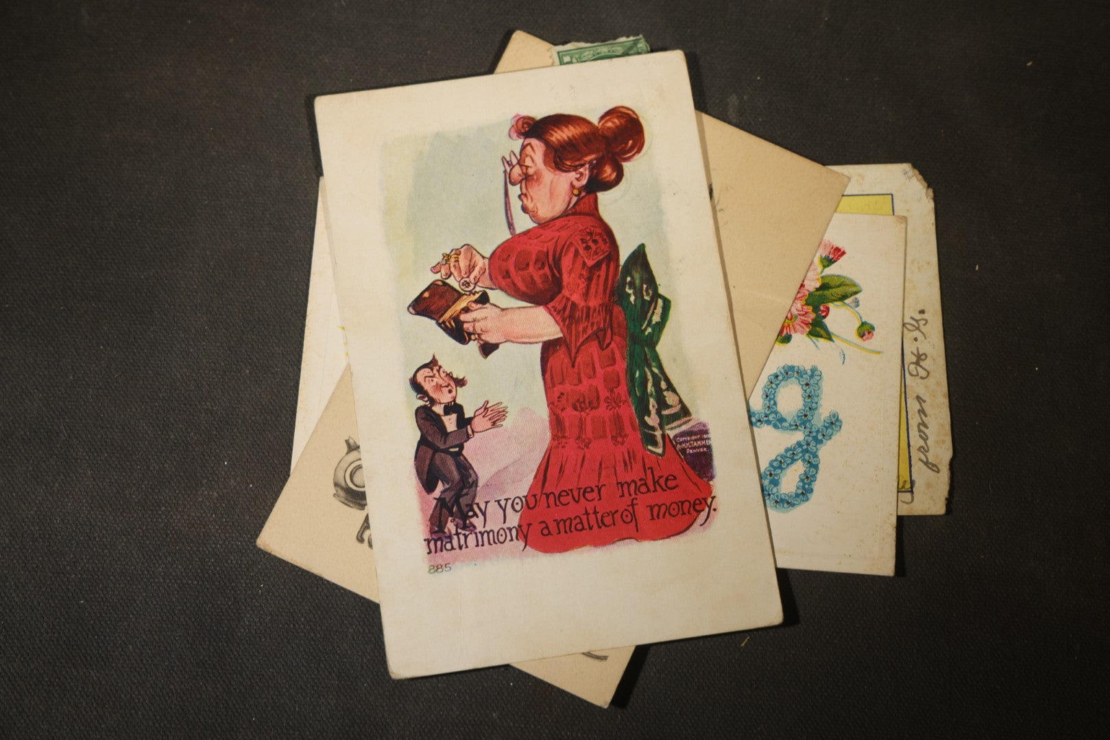 Grouping of approximately 25 Antique and Vintage Postcards including Comic, Greeting, Floral, and Holiday Subjects