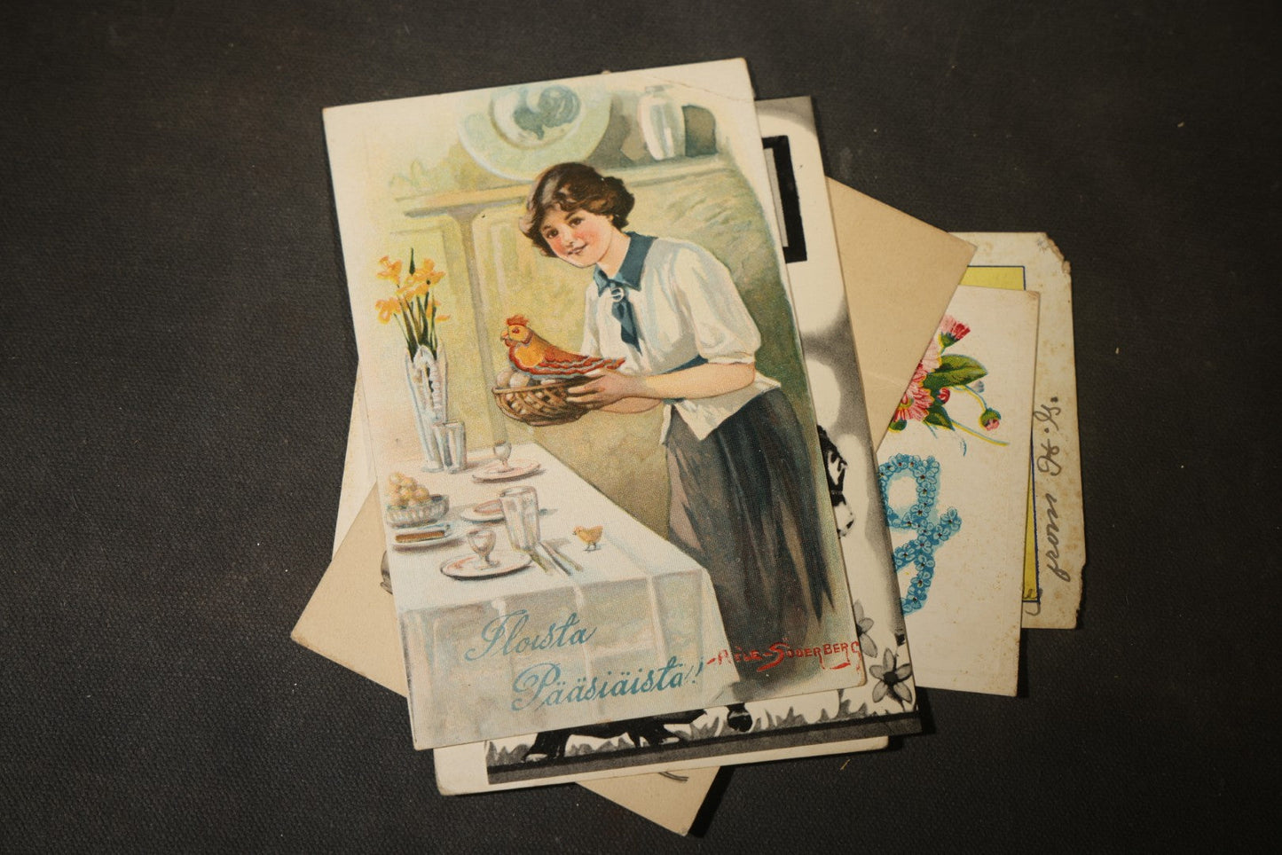 Grouping of approximately 25 Antique and Vintage Postcards including Comic, Greeting, Floral, and Holiday Subjects