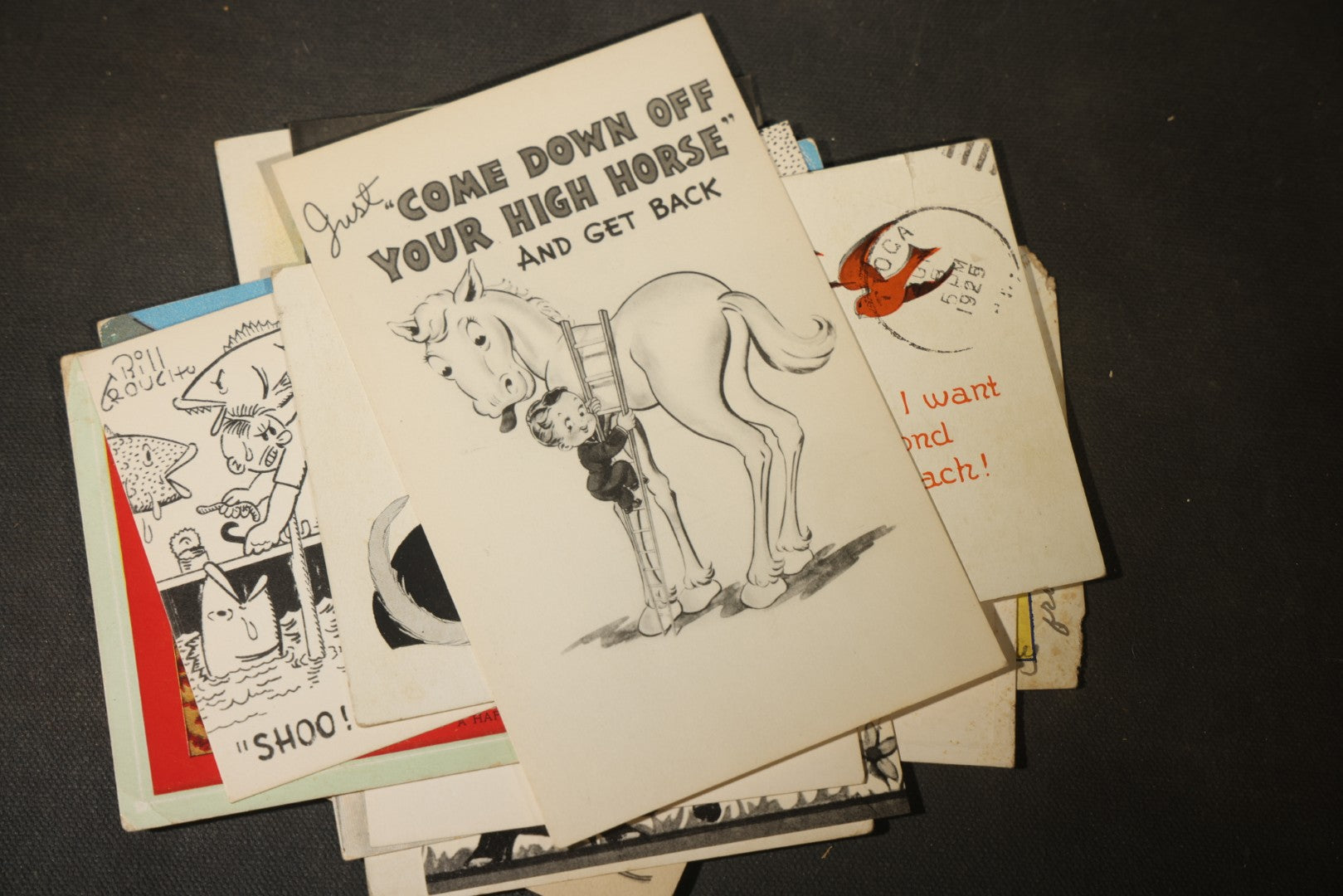 Grouping of approximately 25 Antique and Vintage Postcards including Comic, Greeting, Floral, and Holiday Subjects
