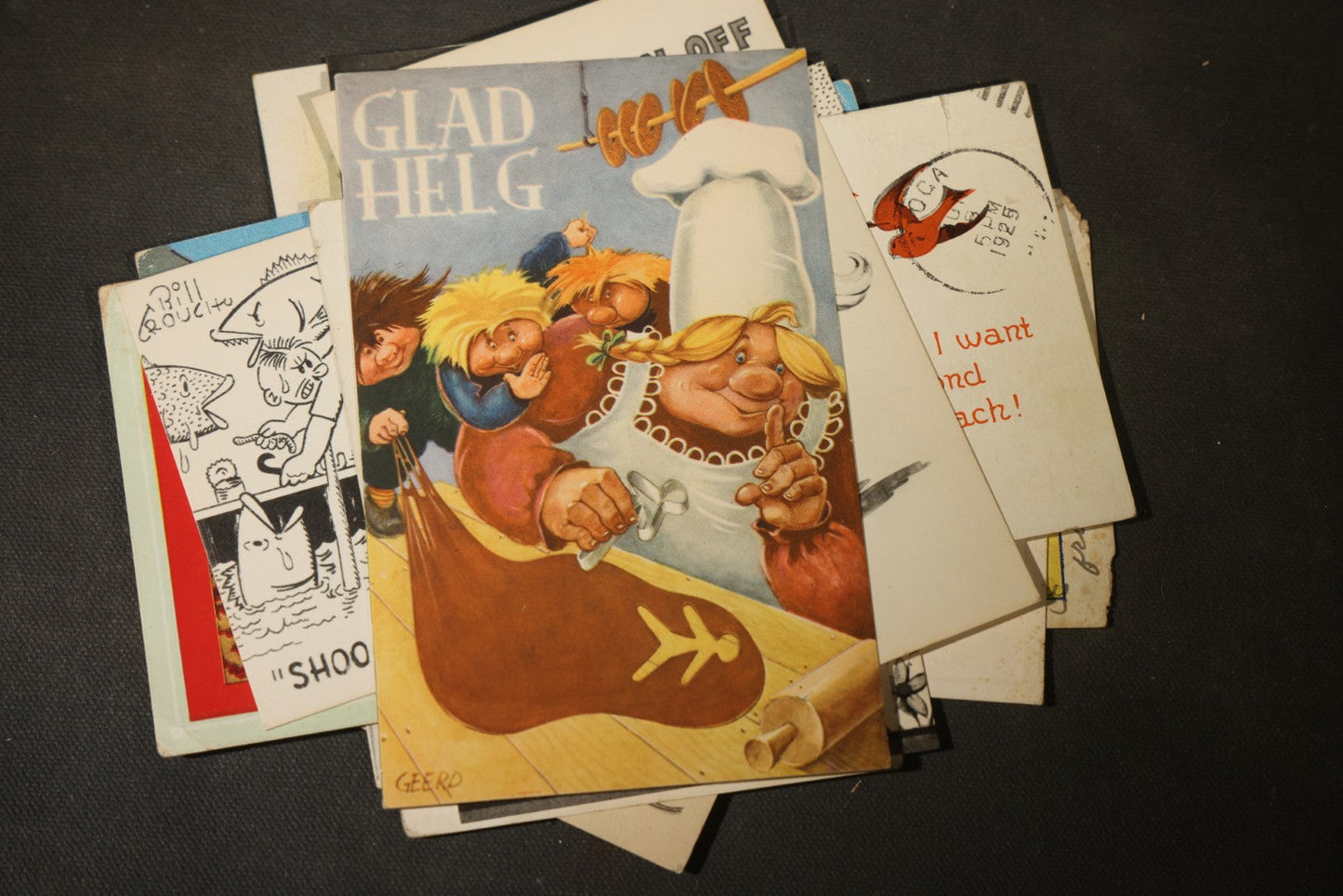 Grouping of approximately 25 Antique and Vintage Postcards including Comic, Greeting, Floral, and Holiday Subjects