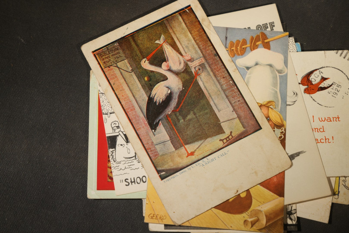 Grouping of approximately 25 Antique and Vintage Postcards including Comic, Greeting, Floral, and Holiday Subjects