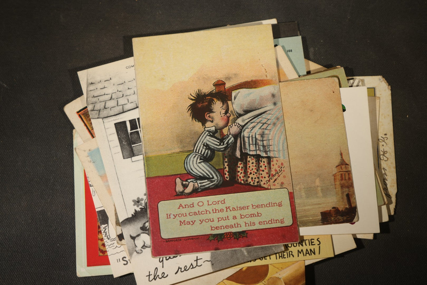 Grouping of approximately 25 Antique and Vintage Postcards including Comic, Greeting, Floral, and Holiday Subjects
