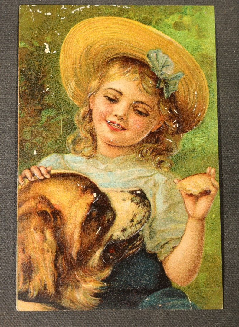 Grouping of approximately 15 Antique and Vintage Postcards including Girl with Dog, Romantic Couples, and Women's Portraits