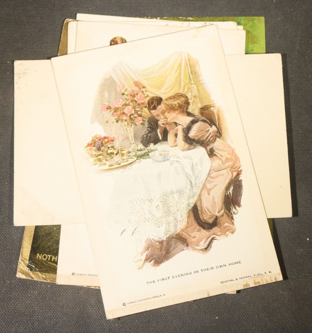 Grouping of approximately 15 Antique and Vintage Postcards including Girl with Dog, Romantic Couples, and Women's Portraits