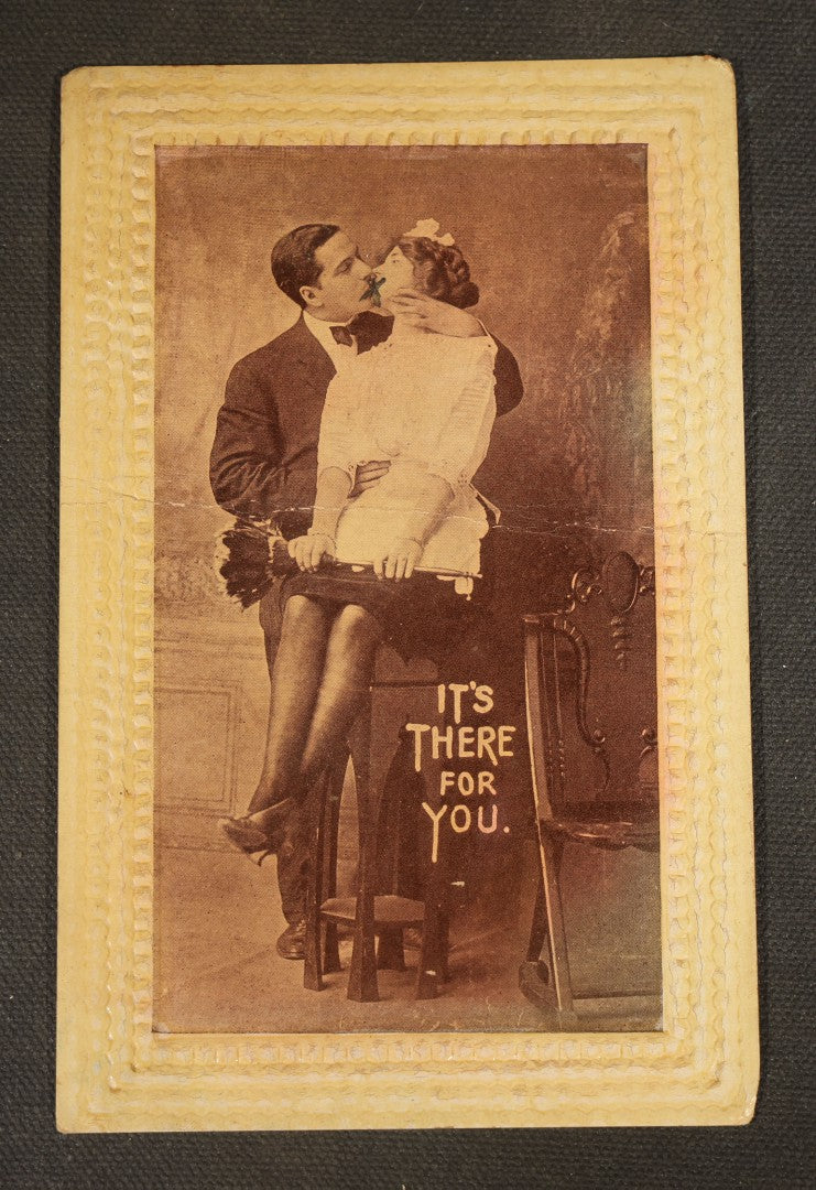 Grouping of Five Antique Embossed-Border Romantic Postcards with Photographic Vignettes of Couples including "I.O.U. A Kiss," "U.O.Me A Squeeze," and "It's There For You"