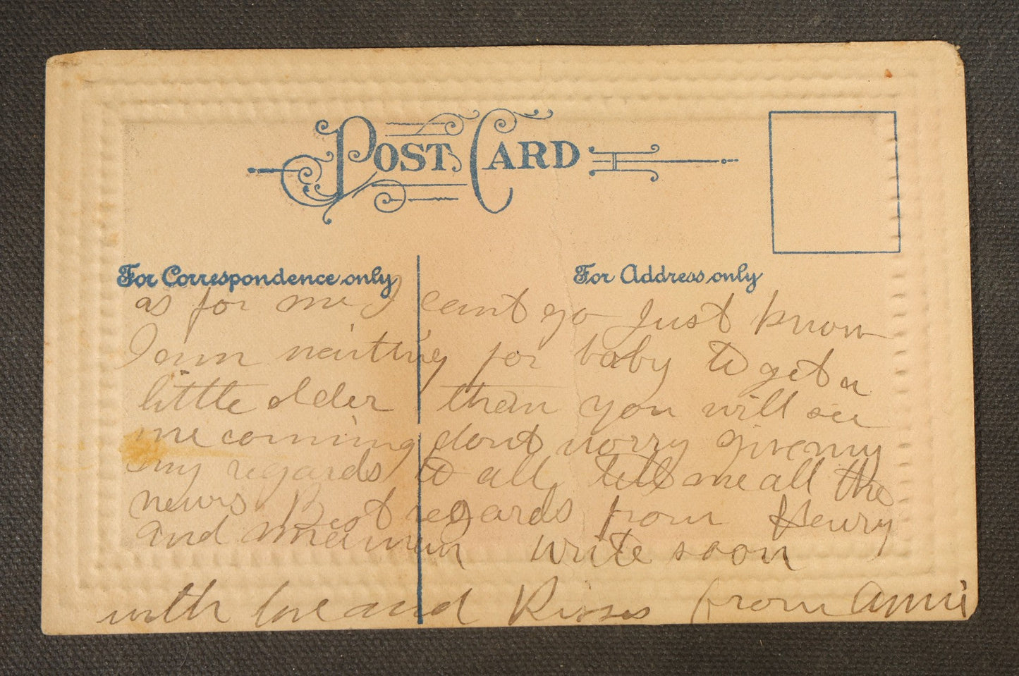 Grouping of Five Antique Embossed-Border Romantic Postcards with Photographic Vignettes of Couples including "I.O.U. A Kiss," "U.O.Me A Squeeze," and "It's There For You"