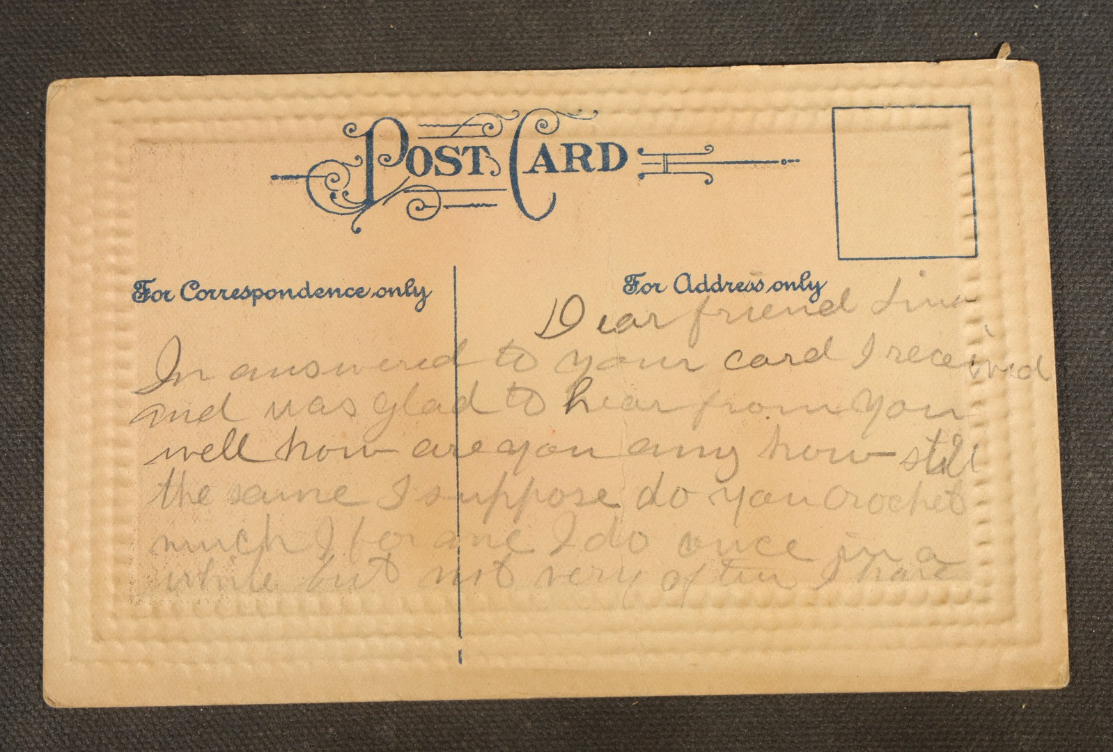 Grouping of Five Antique Embossed-Border Romantic Postcards with Photographic Vignettes of Couples including "I.O.U. A Kiss," "U.O.Me A Squeeze," and "It's There For You"