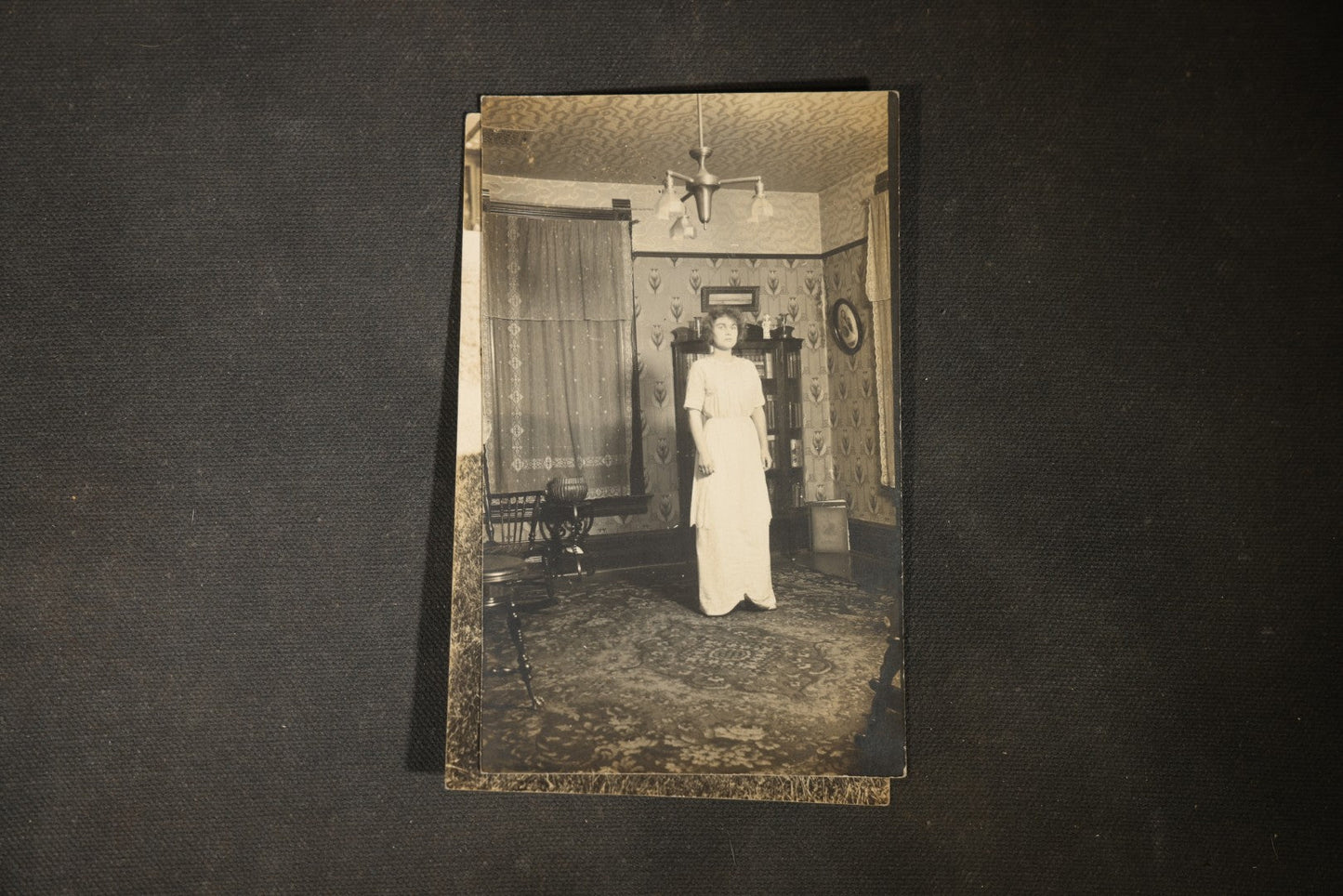 Grouping of approximately 40 Antique Real Photo Postcards R.P.P.C. including Military Soldier Portrait, Ocean Liner, Marching Band, and Portraits