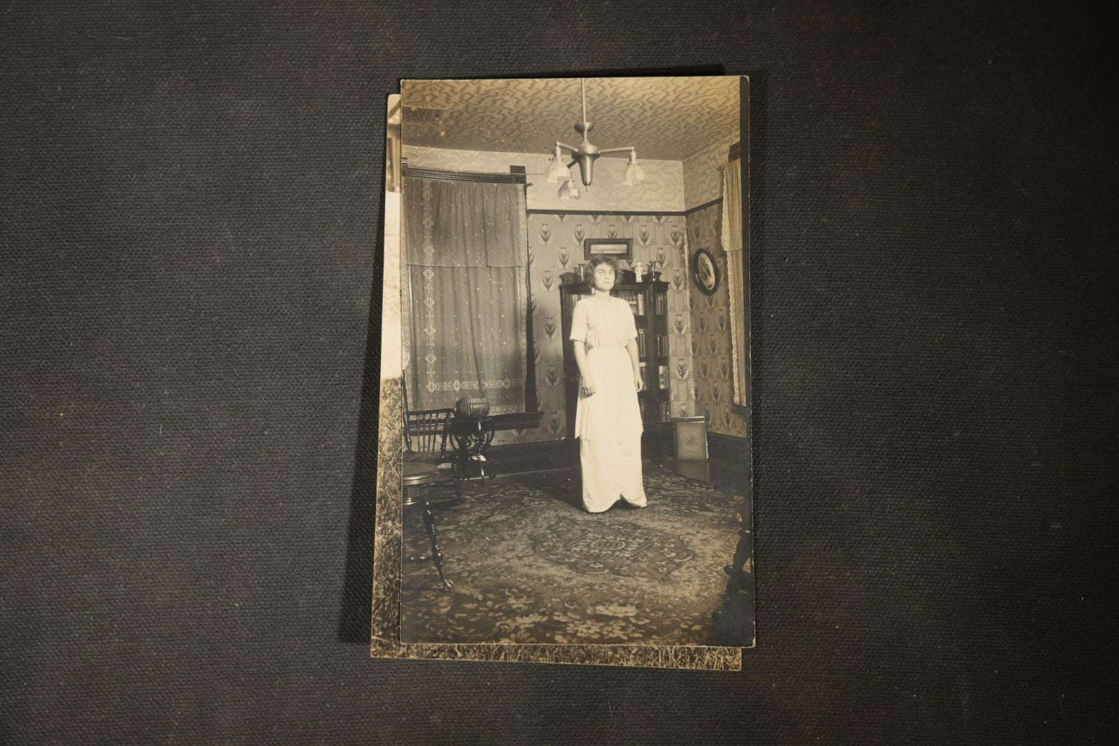 Grouping of approximately 40 Antique Real Photo Postcards R.P.P.C. including Military Soldier Portrait, Ocean Liner, Marching Band, and Portraits